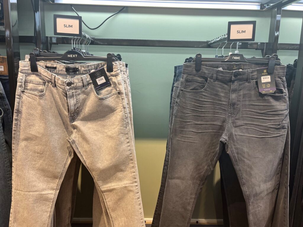90x60mm Reflex Affinity Black Foamex Frame Graphic Holder in Next displaying information on the style of jeans in the menswear department.